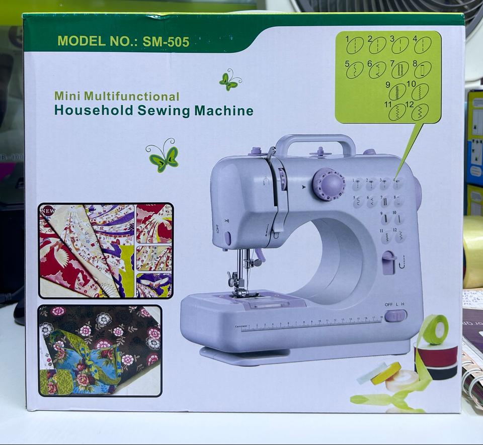 MAQUINA DE COSER COM MESA DE 12 PUNTADAS MULTIFUNCIONAL SM 505